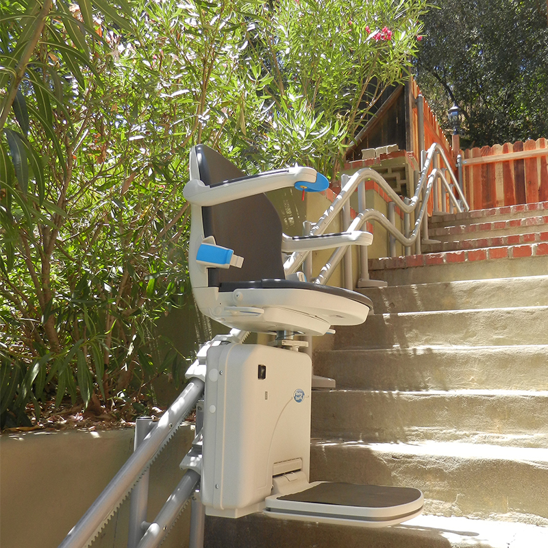 Kraus Handicare 2000 Outdoor exterior outside concrete floors double rail stair chair lift